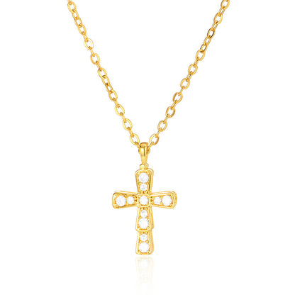 Elegant gold cross pendant necklace featuring brilliant zircon accents in a classic religious starburst design