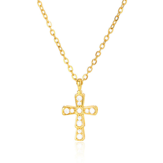 Elegant gold cross pendant necklace featuring brilliant zircon accents in a classic religious starburst design