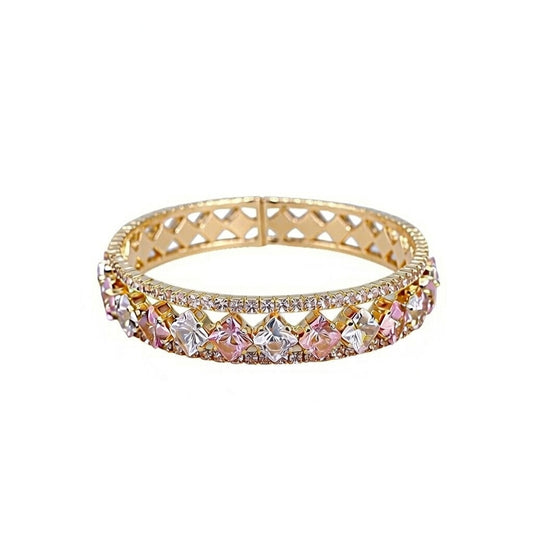 Elegant gold double-layer open bangle with pink gemstone centers and sparkling white zirconia halo