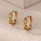 Paired minimalist gold stud earrings featuring a polished infinity symbol design for an elegant, timeless look