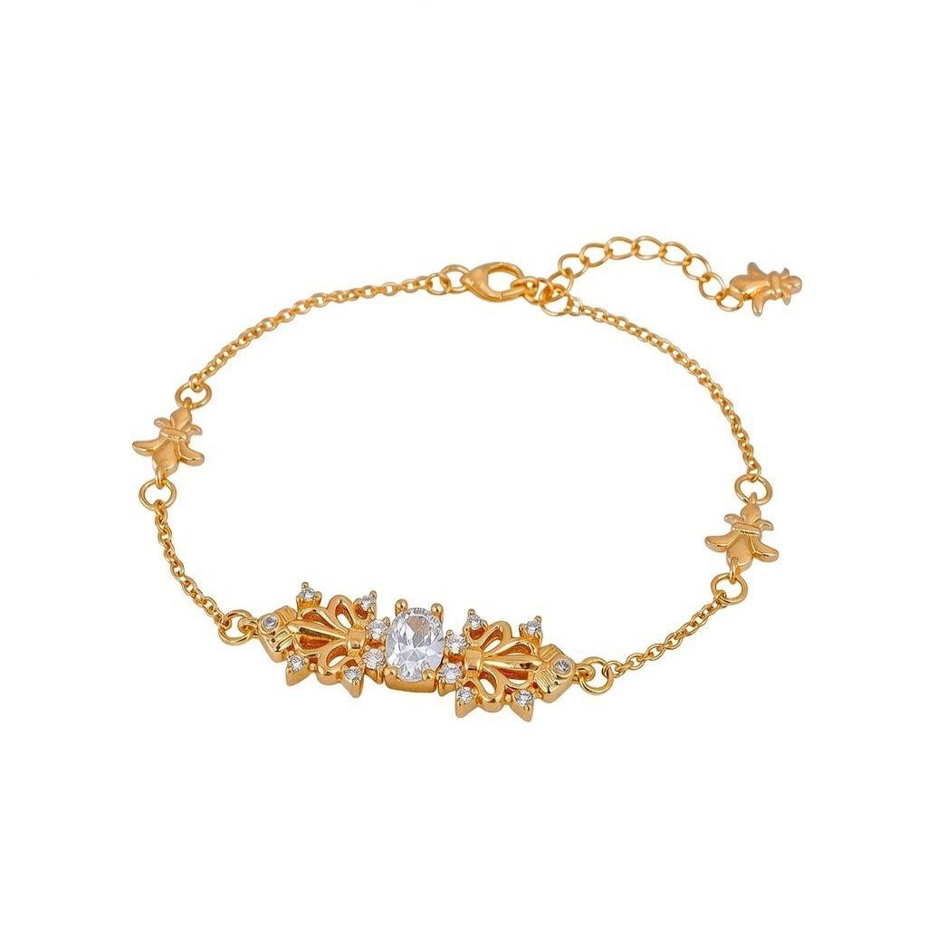 Elegant gold bracelet featuring a delicate iris flower charm paved with sparkling white cubic zirconia