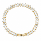 Elegant gold tennis bracelet featuring marquise-cut white cubic zirconia stones in a leaf-style continuous link