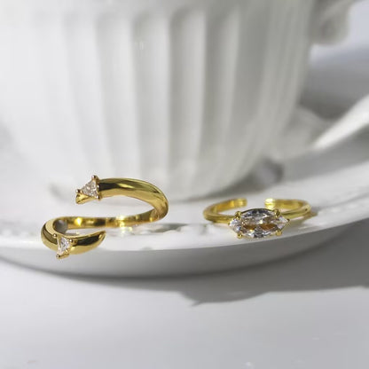 Elegant Gold Stackable Ring featuring a Marquise-cut Zircon centerpiece with Sparkling Pavé Accents on a Wavy Band