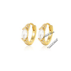 Elegant paired gold huggie hoop earrings with continuous clear zirconia and a central marquise-cut stone