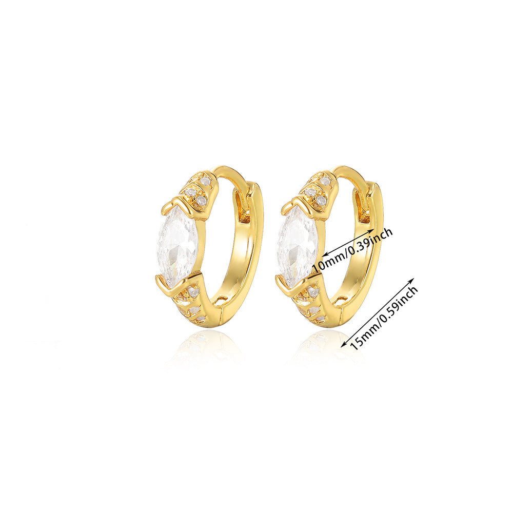Elegant paired gold huggie hoop earrings with continuous clear zirconia and a central marquise-cut stone