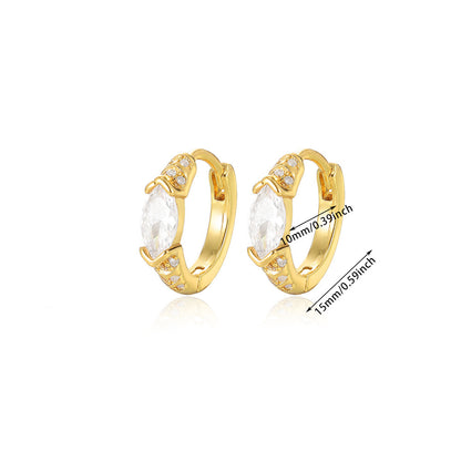 Elegant paired gold huggie hoop earrings with continuous clear zirconia and a central marquise-cut stone