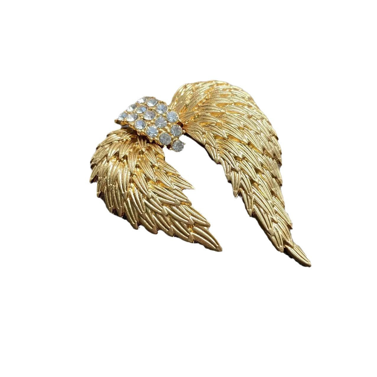 Elegant gold plated angel wing brooch featuring shimmering white cubic zirconia stones in a detailed feather design