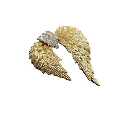 Elegant gold plated angel wing brooch featuring shimmering white cubic zirconia stones in a detailed feather design