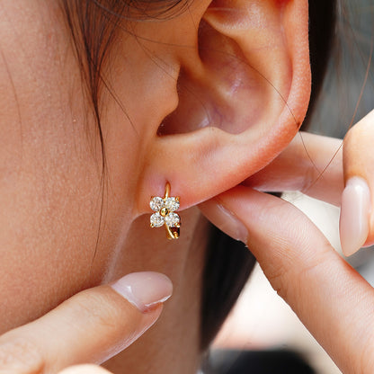 Gold S925 silver clover stud earrings featuring a brilliant moissanite pave setting for a lucky, elegant look