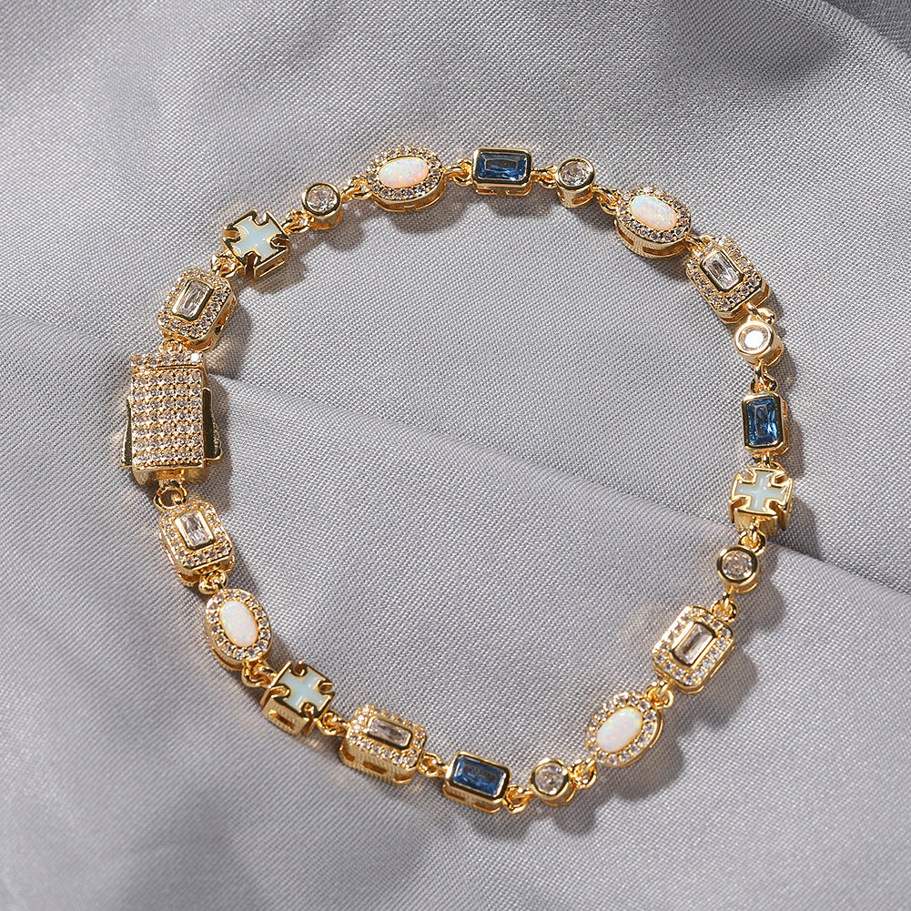 Luxurious halo bracelet with multicolor gemstones and white zirconia, available in gold and silver plated finishes