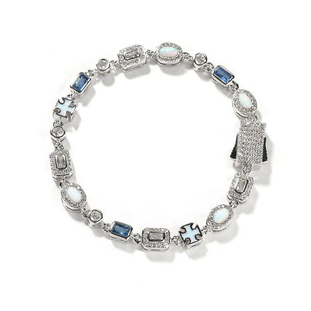 Luxurious halo bracelet with multicolor gemstones and white zirconia, available in gold and silver plated finishes