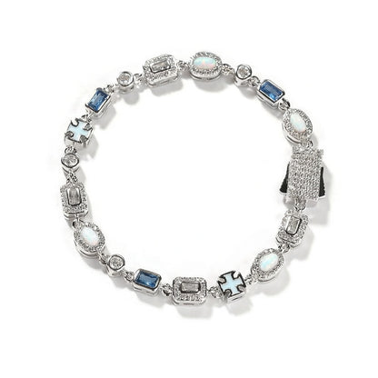 Luxurious halo bracelet with multicolor gemstones and white zirconia, available in gold and silver plated finishes