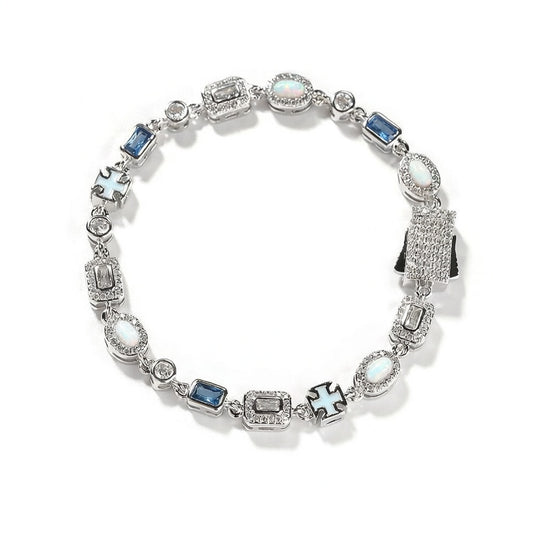 Luxurious halo bracelet with multicolor gemstones and white zirconia, available in gold and silver plated finishes