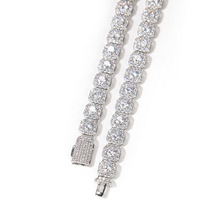 Elegant halo bracelet with a round cubic zirconia center and silver gold plating in a minimalist chain design