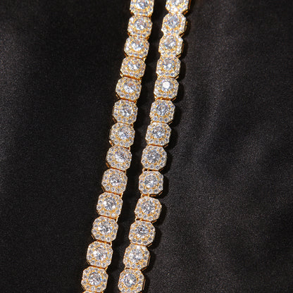 Elegant halo bracelet with a round cubic zirconia center and silver gold plating in a minimalist chain design