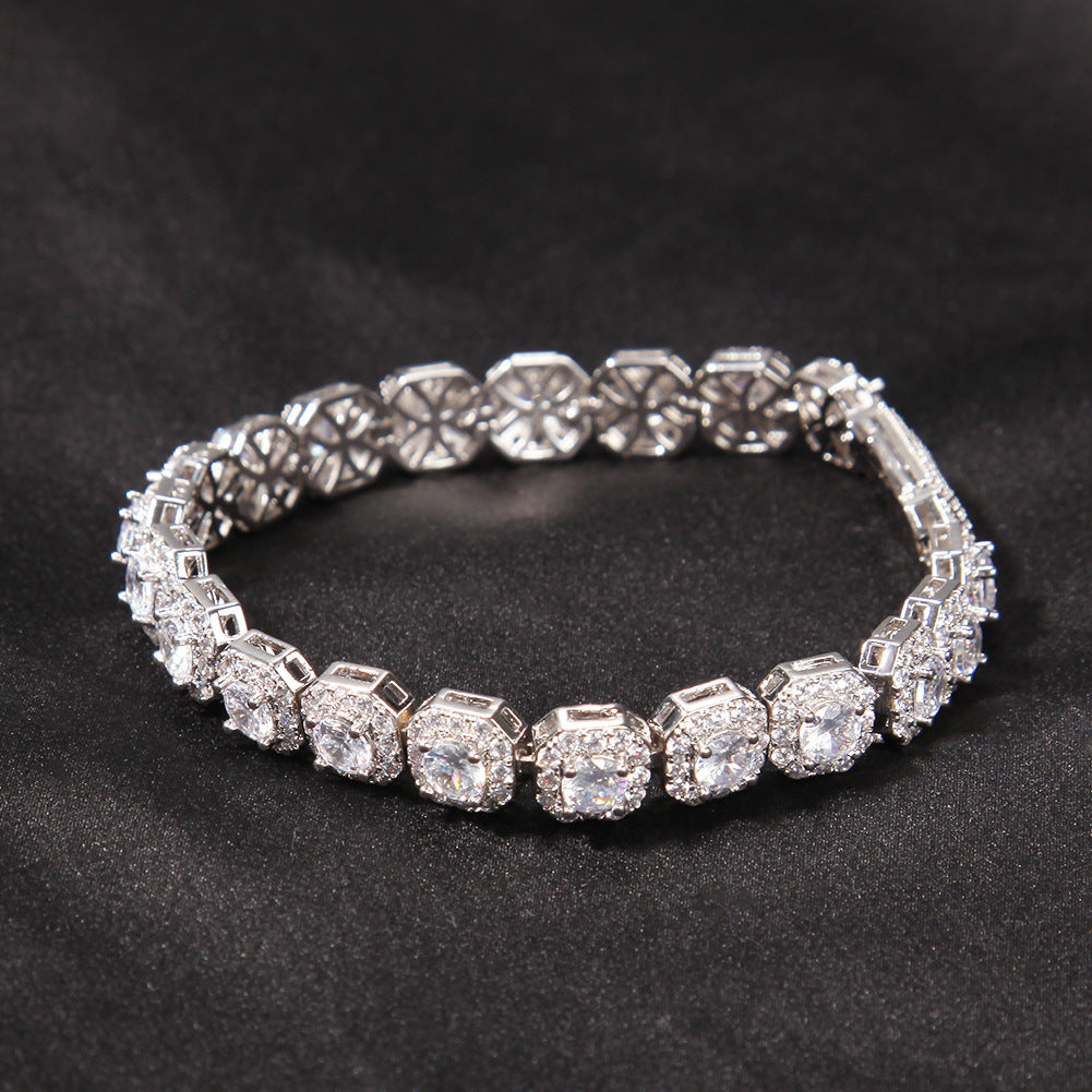 Elegant halo bracelet with a round cubic zirconia center and silver gold plating in a minimalist chain design
