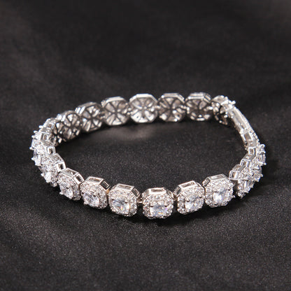 Elegant halo bracelet with a round cubic zirconia center and silver gold plating in a minimalist chain design