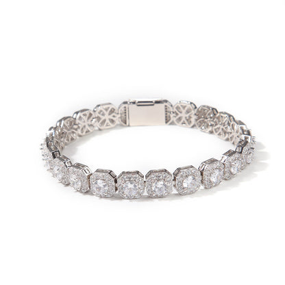 Elegant halo bracelet with a round cubic zirconia center and silver gold plating in a minimalist chain design