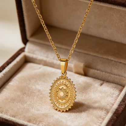 Radiant gold sun medallion pendant necklace featuring a bold sunburst design on a delicate chain for a vintage celestial look