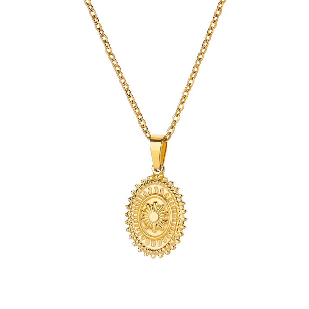 Radiant gold sun medallion pendant necklace featuring a bold sunburst design on a delicate chain for a vintage celestial look