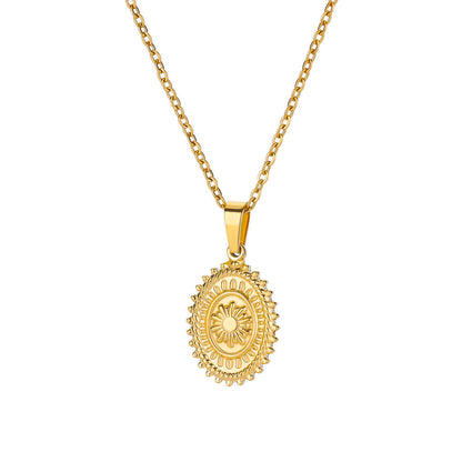 Radiant gold sun medallion pendant necklace featuring a bold sunburst design on a delicate chain for a vintage celestial look
