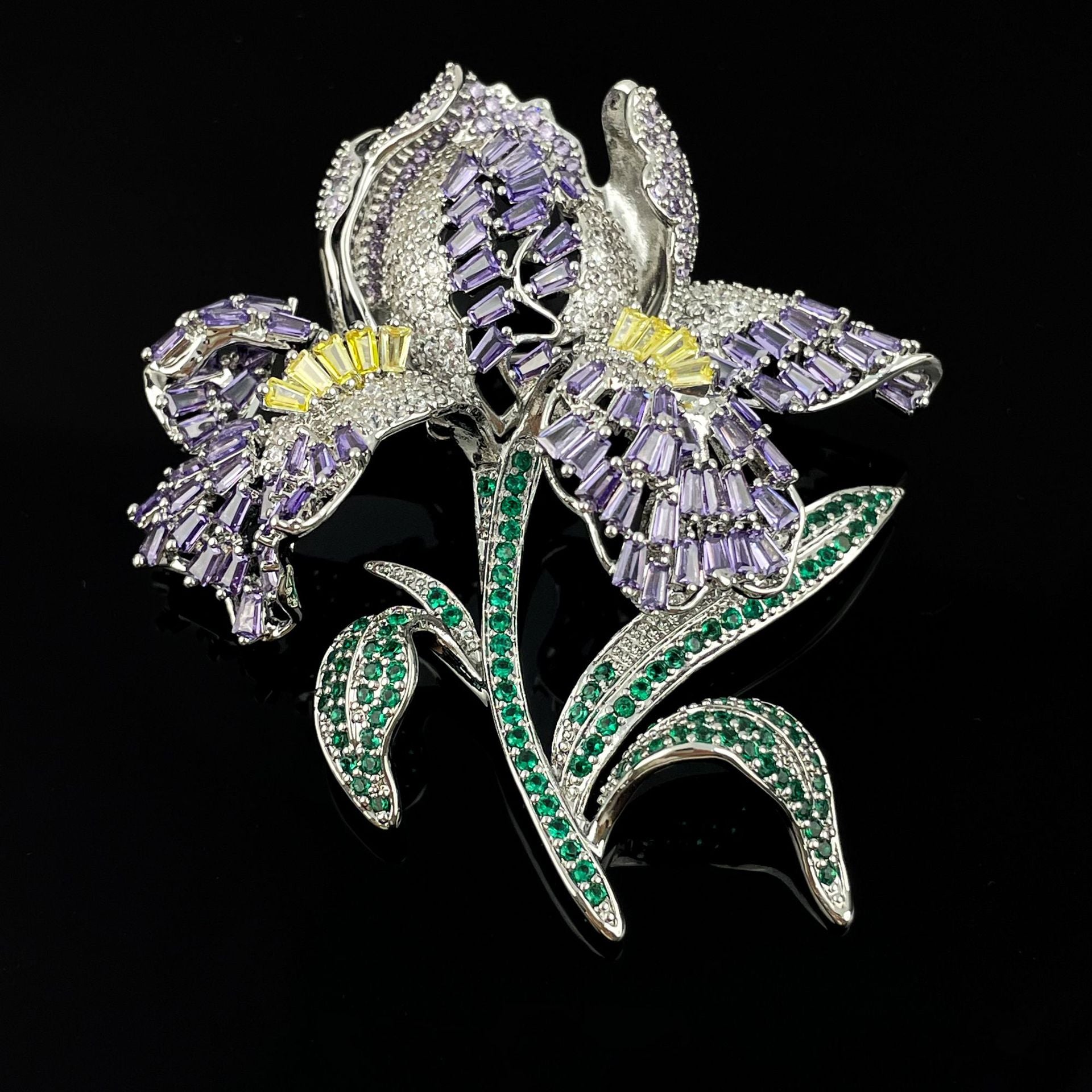 Elegant lily flower brooch with gradient-colored cubic zirconia petals and a sparkling crystal center