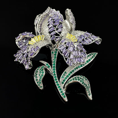 Elegant lily flower brooch with gradient-colored cubic zirconia petals and a sparkling crystal center