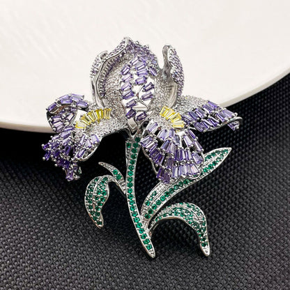 Elegant lily flower brooch with gradient-colored cubic zirconia petals and a sparkling crystal center