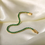 Round emerald green cubic zirconia cz crystal tennis chain bracelet stainless steel jewelry in waterproof 18k gold plated finish.
