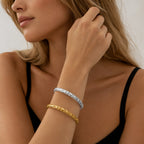 Organic hammered texture open cuff bangle in waterproof 18k gold plated stainless steel jewelry.