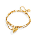 Puffy heart charm and paperclip link chain stainless steel jewelry bracelet in waterproof 18k gold plated finish.