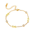 Gold infinity symbol and bezel set cubic zirconia station charm bracelet in 18k gold plated jewelry