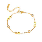 Gold infinity symbol and bezel set cubic zirconia station charm bracelet in 18k gold plated jewelry