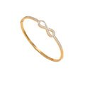 Infinity loop motif pave cubic zirconia accent stainless steel jewelry bangle in waterproof 18k gold plated finish.