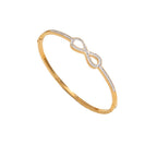 Infinity loop motif pave cubic zirconia accent stainless steel jewelry bangle in waterproof 18k gold plated finish.