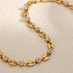 Coffee bean mariner link and round clear cubic zirconia station bracelet in 18k gold plated jewelry