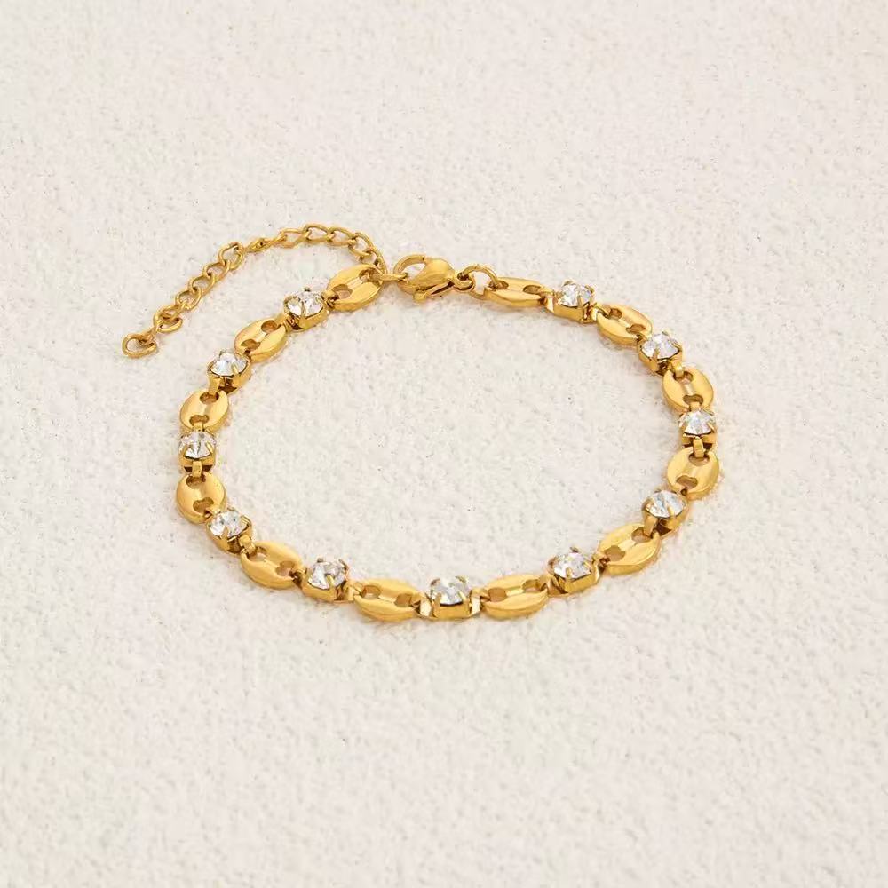 Coffee bean mariner link and round clear cubic zirconia station bracelet in 18k gold plated jewelry