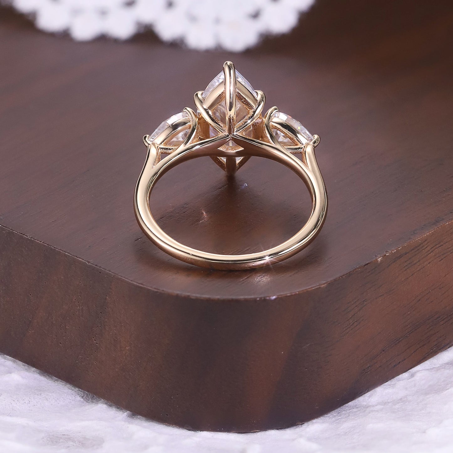 Marquise cut moissanite three-stone engagement ring with pear-shaped side stones in 18K gold plated S925 sterling silver