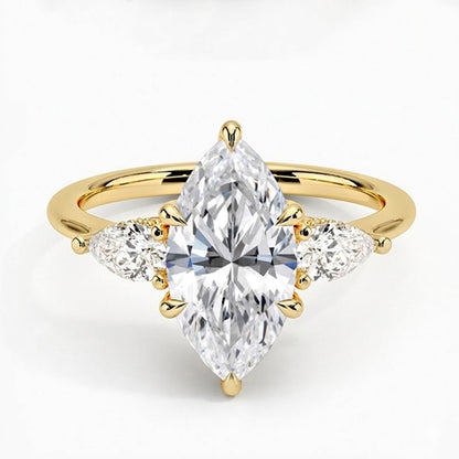 Marquise cut moissanite three-stone engagement ring with pear-shaped side stones in 18K gold plated S925 sterling silver