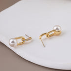 Minimalist S925 silver drop earrings with 18K gold plating, sparkling zircon, and a dangling white pearl
