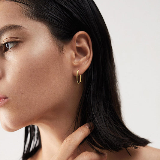 Minimalist S925 silver geometric stud earrings with 18K gold plating. Sleek, modern, and pearl-free design