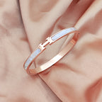Mother of pearl inlaid H letter buckle hinged cuff bangle in 18k gold plated 316l titanium steel jewelry.