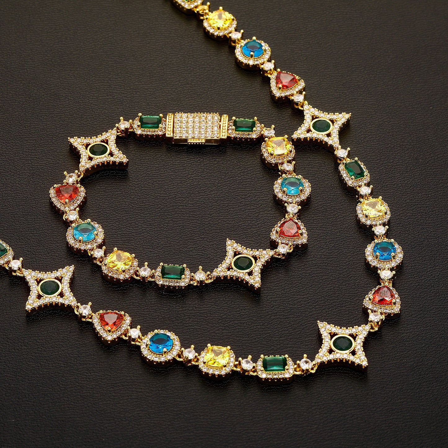 Elegant necklace featuring a vibrant multicolor gemstone pendant on a classic chain, available in gold and silver finishes