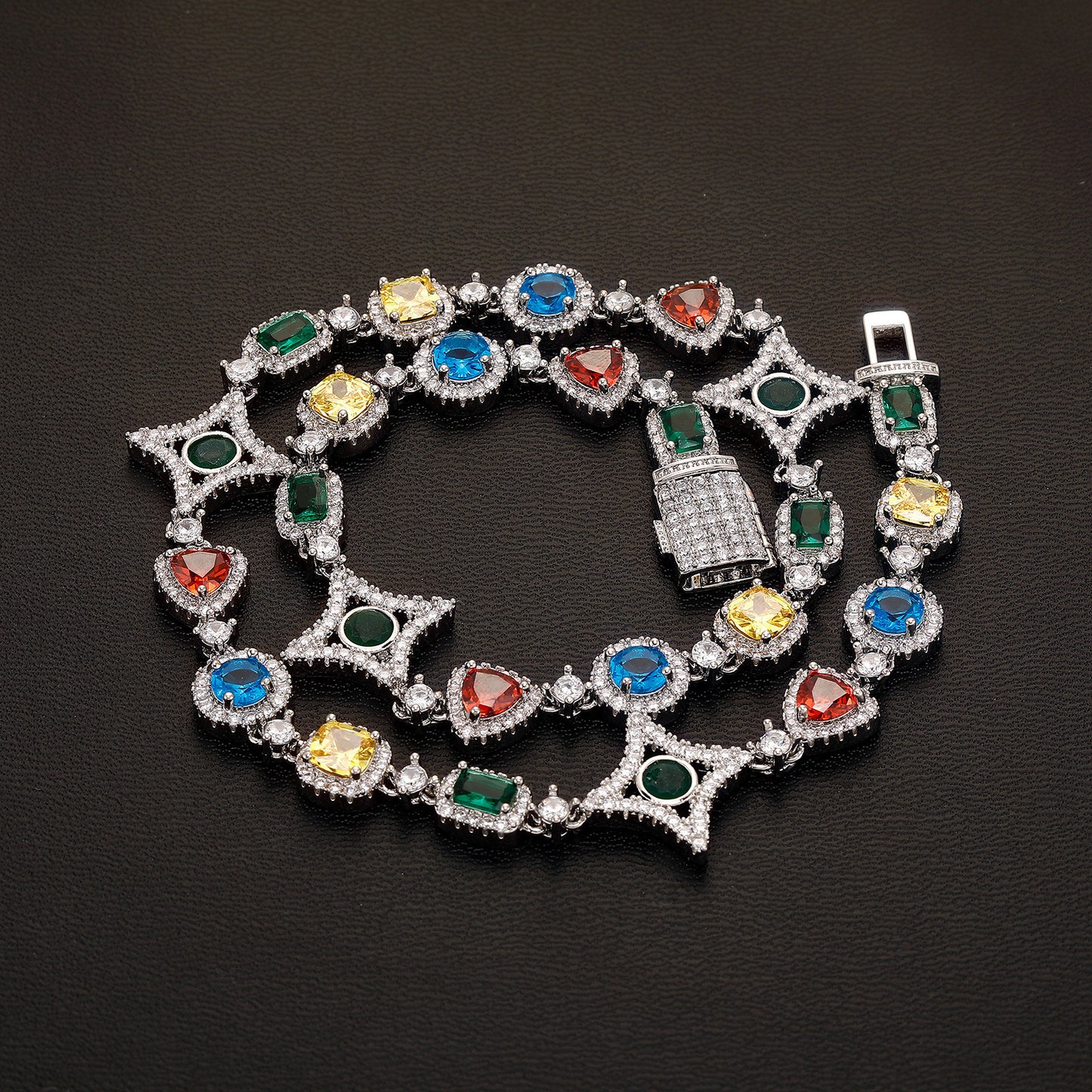 Elegant necklace featuring a vibrant multicolor gemstone pendant on a classic chain, available in gold and silver finishes