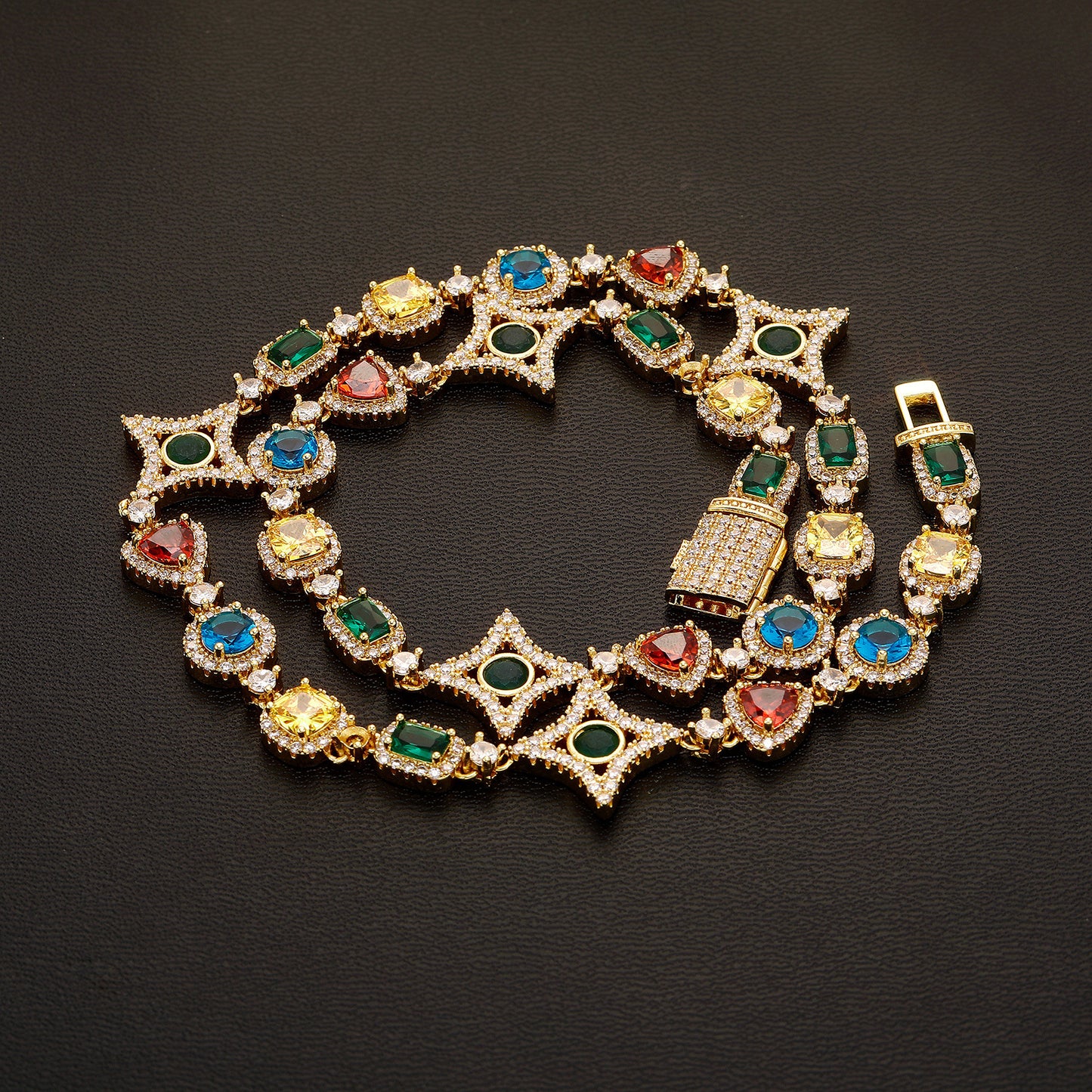 Elegant necklace featuring a vibrant multicolor gemstone pendant on a classic chain, available in gold and silver finishes