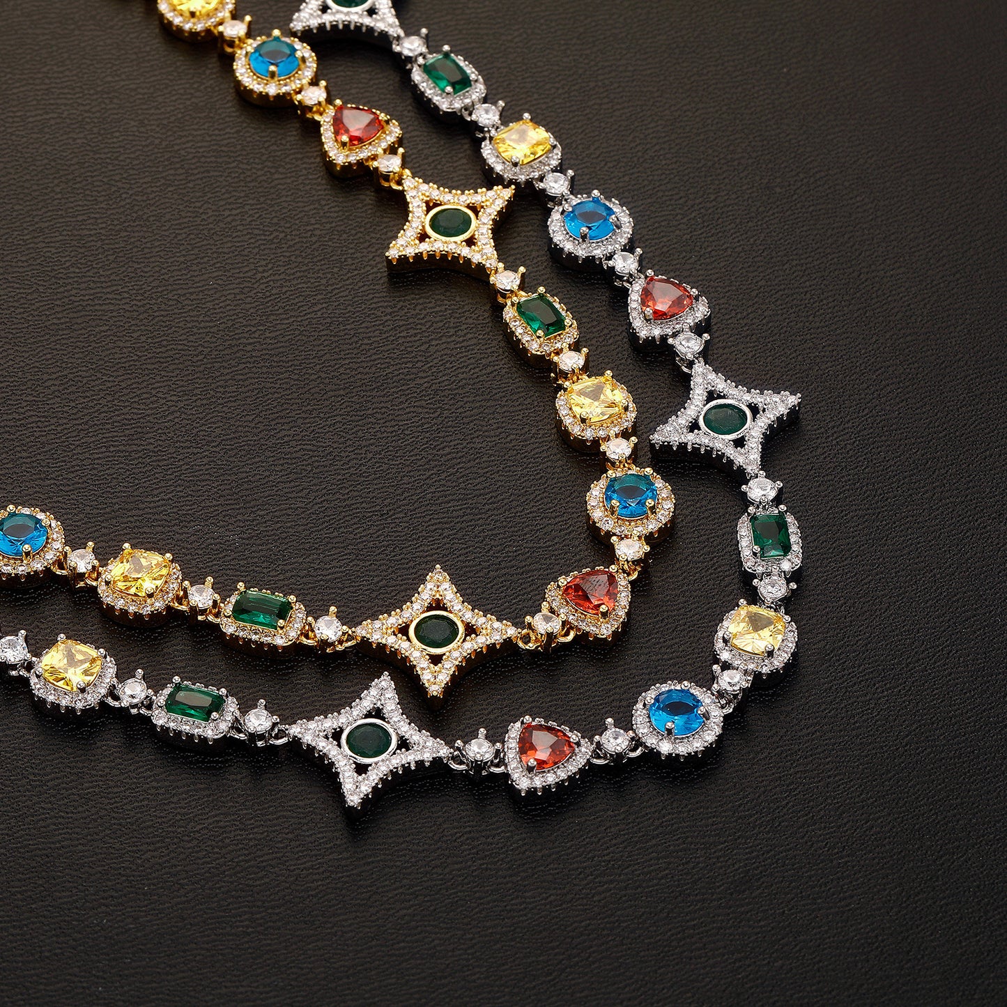 Elegant necklace featuring a vibrant multicolor gemstone pendant on a classic chain, available in gold and silver finishes