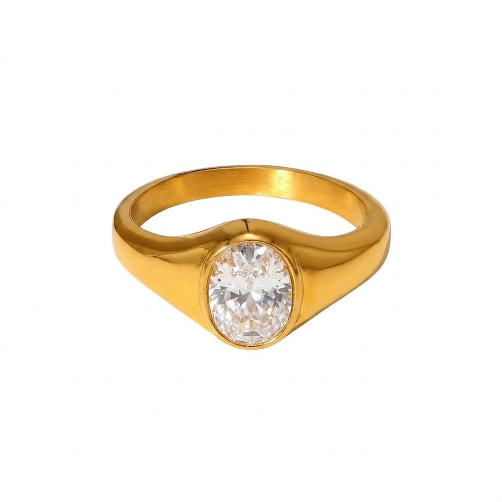 Oval solitaire clear cubic zirconia cz crystal bezel set chunky dome signet ring stainless steel jewelry in waterproof 18k gold plated finish.