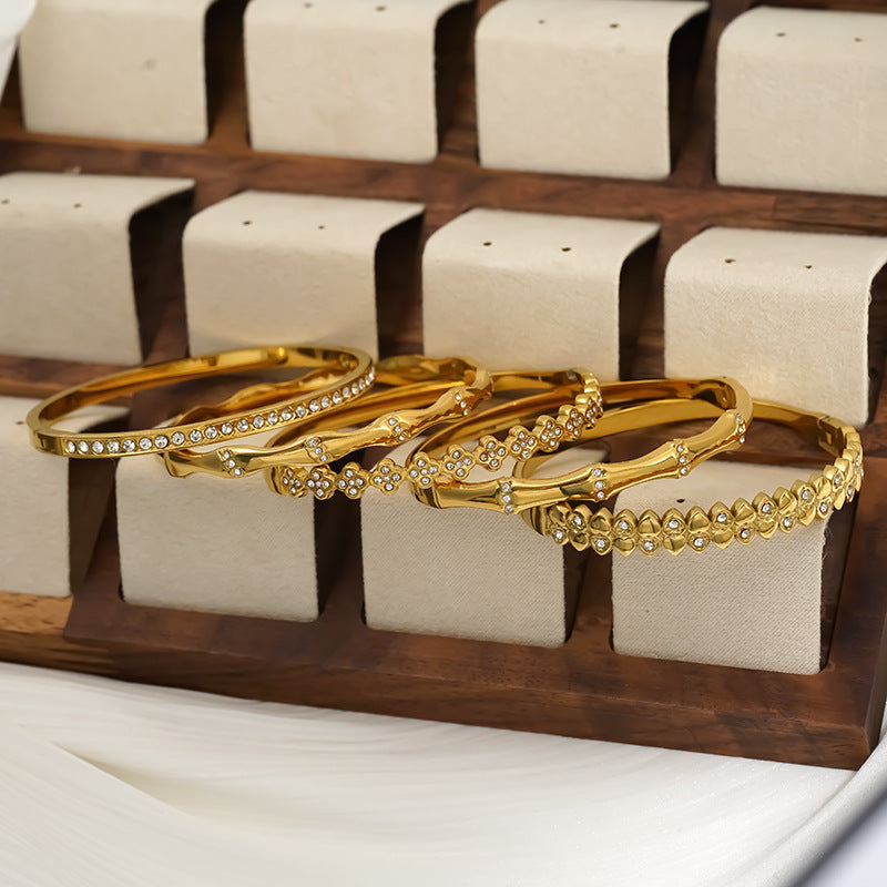 Wholesale 304 stainless steel gold bangle by Prismfire Jewelry for boutique resale