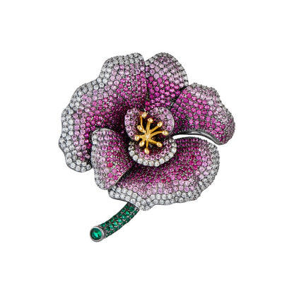 Elegant camellia brooch with purple gradient cubic zirconia petals, a golden stamen, and a green stem