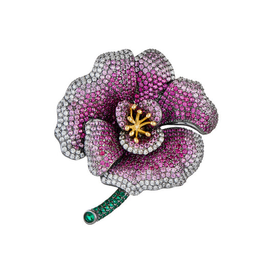 Elegant camellia brooch with purple gradient cubic zirconia petals, a golden stamen, and a green stem